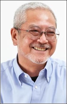 森功至